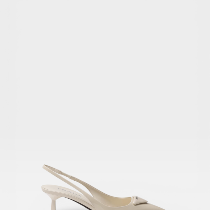 Prada Patent Leather Slingback Pumps in Ivory White.