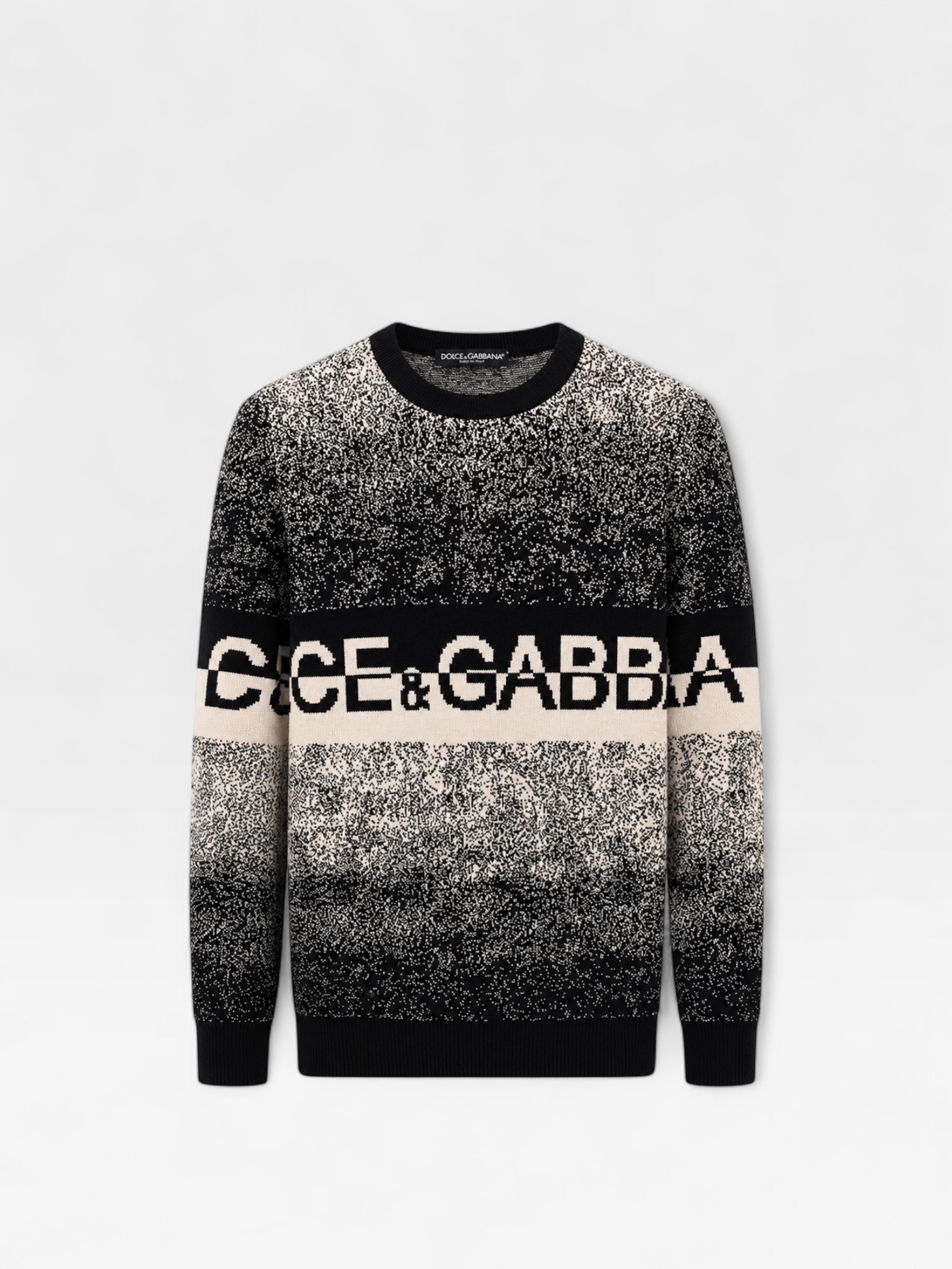 This Dolce & Gabbana sweater features a striking black and white speckled pattern and a bold logo chest band.