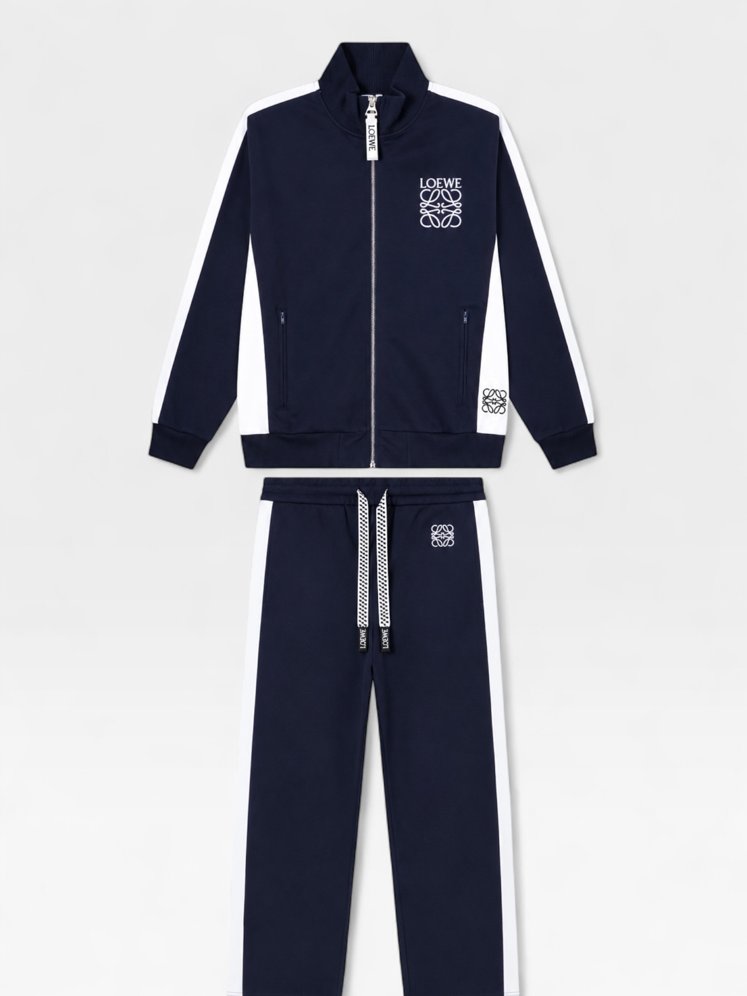 LOEWE technical jersey tracksuit features contrasting white side stripes and the signature Anagram logo embroidery.