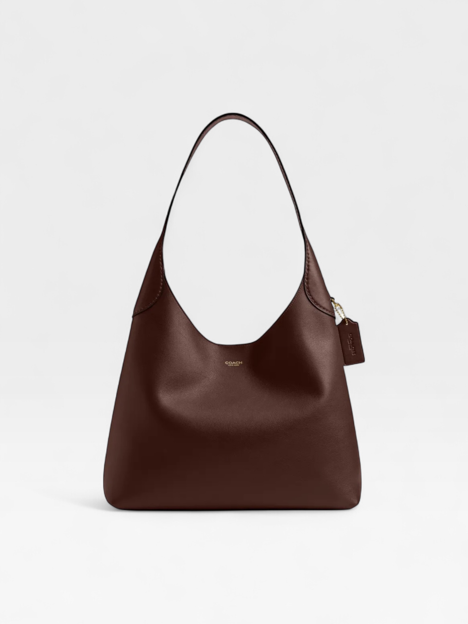 chocolate brown Coach Brooklyn Shoulder Bag 28 is crafted from smooth leather