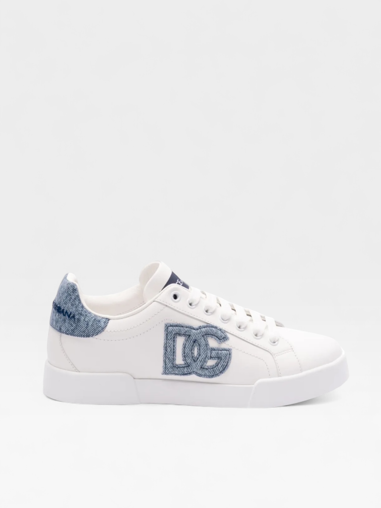 Dolce & Gabbana Portofino sneakers featuring a white leather upper and denim DG logo patch.